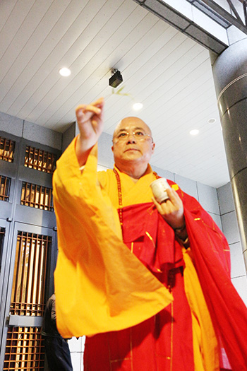 The Abbot President of DDM, Ven. Guo Dong, is purifying and praying for the upcoming Dharma Service.
